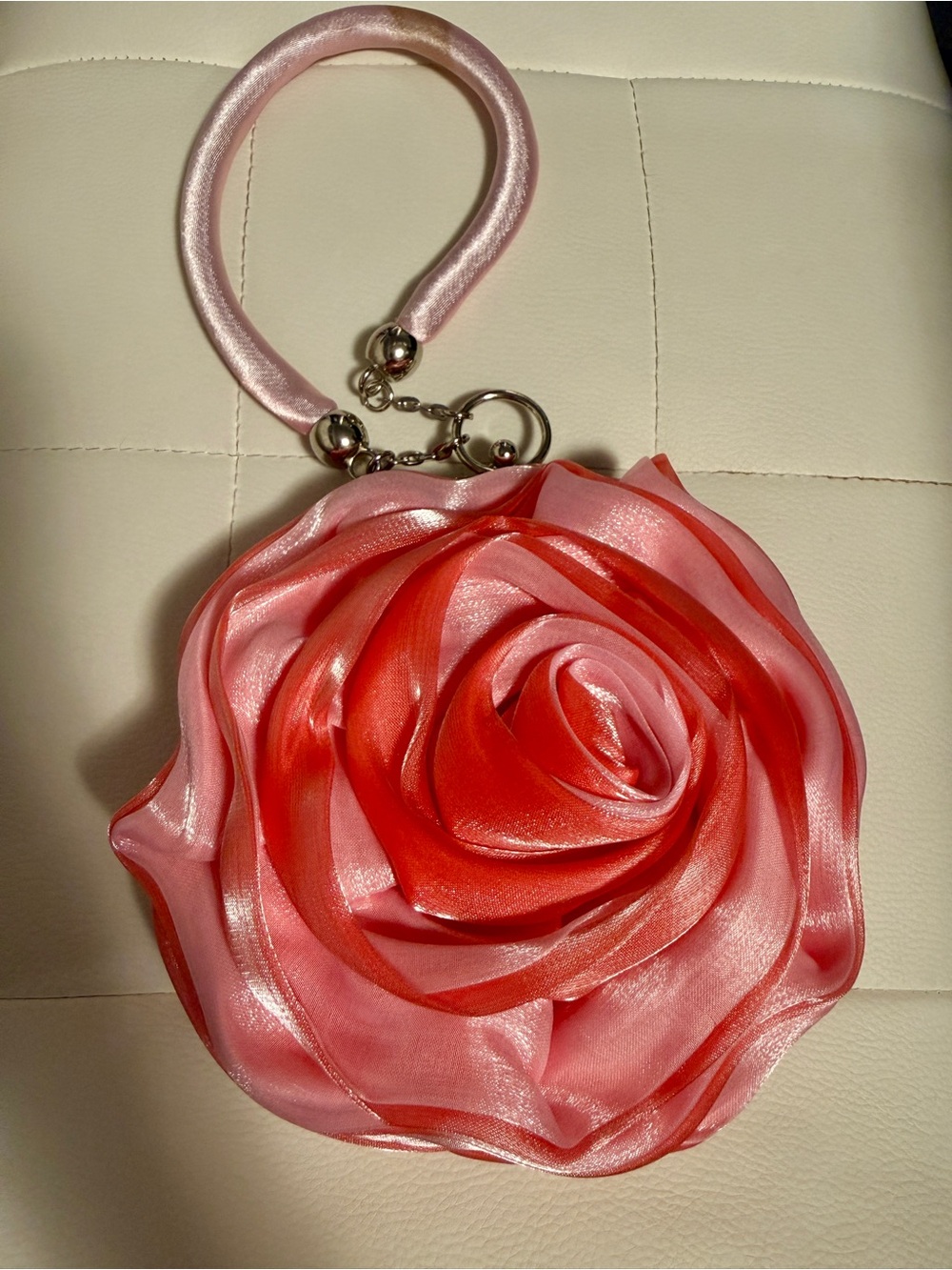 Rose-Embellished Wristlet Clutch in Pink and Red